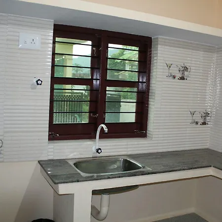 Iroomz Sri Vinayaka Comfort Virajpet